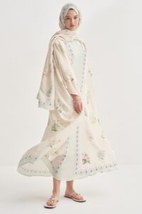 Product Name: Rosmina Cream Floss Kaftan ✨ Tagline: Where elegance flows in every stitch. 📝 Description: Indulge in effortless sophistication with the Rosmina Cream Floss Kaftan — a timeless blend of comfort and luxury. Crafted from soft, breathable fabric in a serene cream hue, this kaftan drapes gracefully for a flattering silhouette. Subtle floss-like embroidery adds a whisper of detail, making it perfect for both relaxed gatherings and refined occasions. Whether paired with delicate accessories for an evening affair or worn as a chic daytime staple, the Rosmina Cream Floss Kaftan embodies understated elegance for the modern woman. Key Features: Premium lightweight fabric for year-round wear Flattering free-flowing cut with graceful drape Delicate tonal embroidery for subtle texture Versatile design for casual and formal styling Easy-care, wrinkle-resistant finish If you’d like, I can now design a modern product image mockup for the Rosmina Cream Floss Kaftan that matches your HABONEBUTIK branding. That would make it ready for your online store. habonebutik